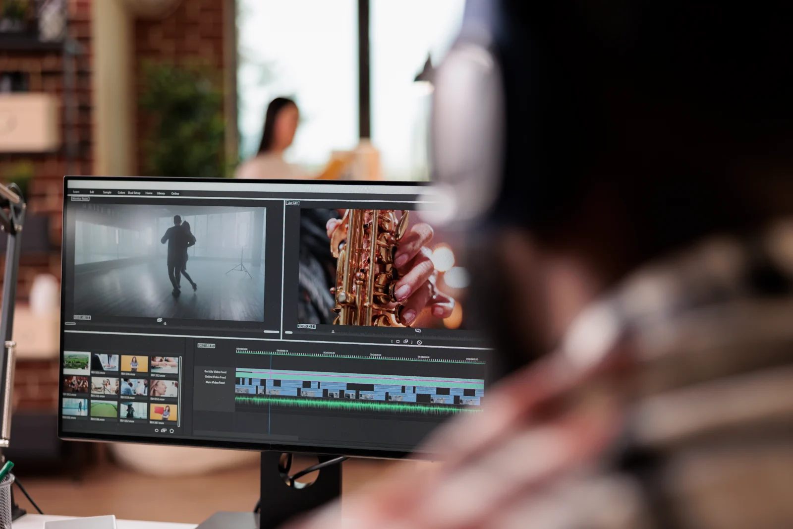 Editor cutting supporting footage on a video editing timeline